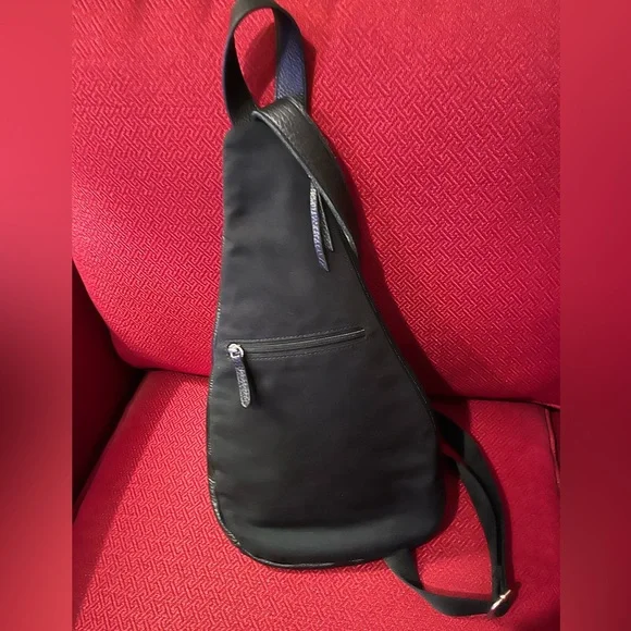 NWOT The Sak Black Leather Sling Backpack - New 5 pocket Leather 1 side canvas. - Picture 3 of 16